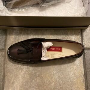 Never worn Cole Haan pinch tassel burgundy leather